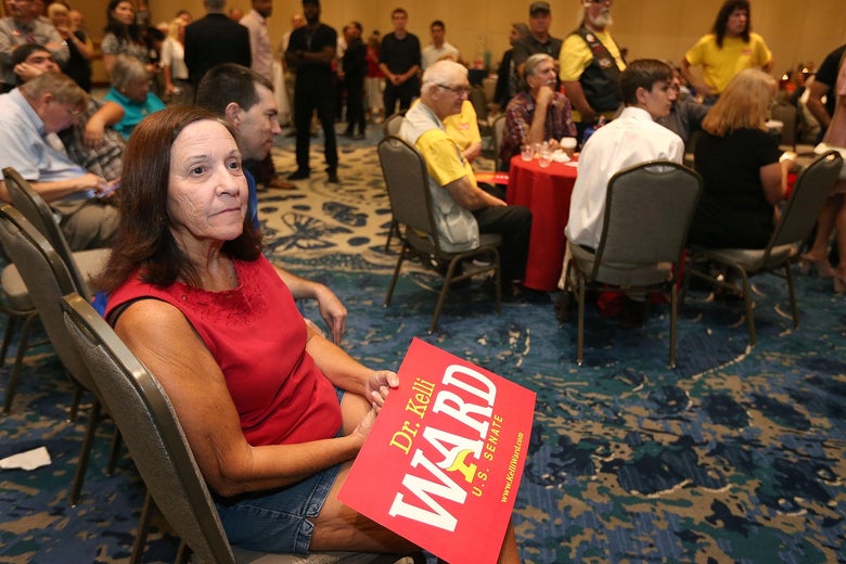 SCOTTSDALE, AZ - AUGUST 28: A campaign supporter for Arizona GOP Senate candidate Kelli Ward watches results at an election night event in which Ward conceded the race on August 28, 2018 in Scottsdale, Arizona. Former state Sen. Ward, U.S. Rep. Martha McSally and former Maricopa County Sheriff Joe Arpaio were vying to replace outgoing Sen. Jeff Flake (R-AZ). (Photo by Ralph Freso/Getty Images)